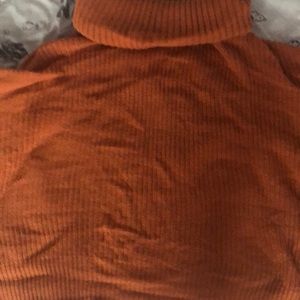 A turtle neck sweater long sleeve